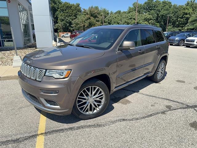 2017 Jeep Grand Cherokee Summit in Brown — front three-quarter view