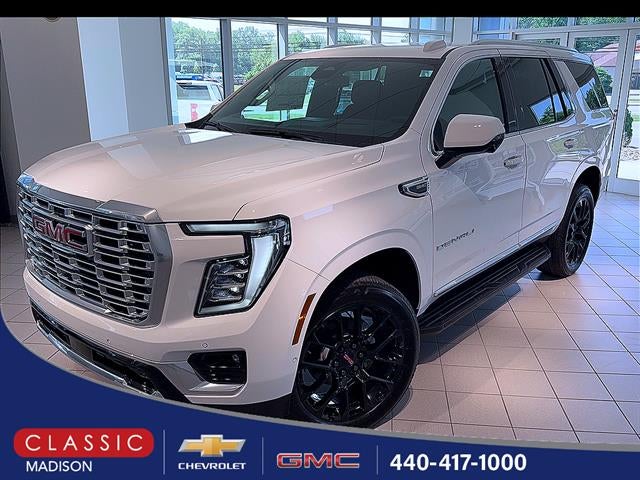 2026 GMC Yukon Denali in Summit White — front three-quarter view