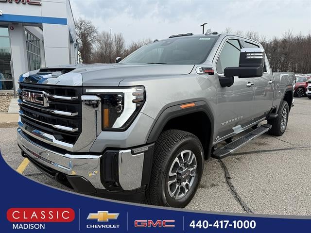 2026 GMC Sierra 2500 HD SLT in Sterling Metallic — front three-quarter view